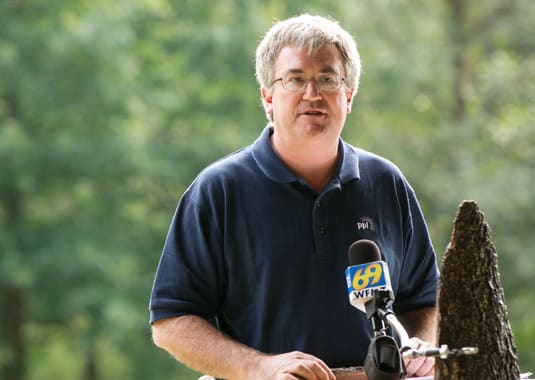 A PPL Speaker's Bureau presenter speaking into microphone