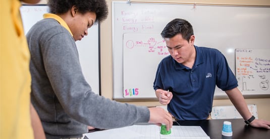 A student and PPL engineer working in classroom