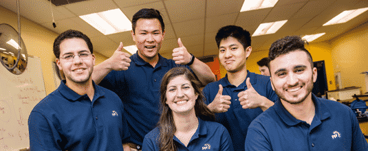 A diverse group of smiling PPL employees