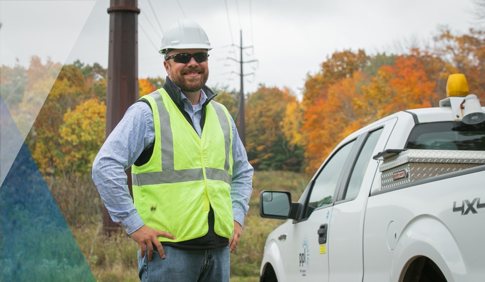 PPL electric utilities worker smiling on the job.