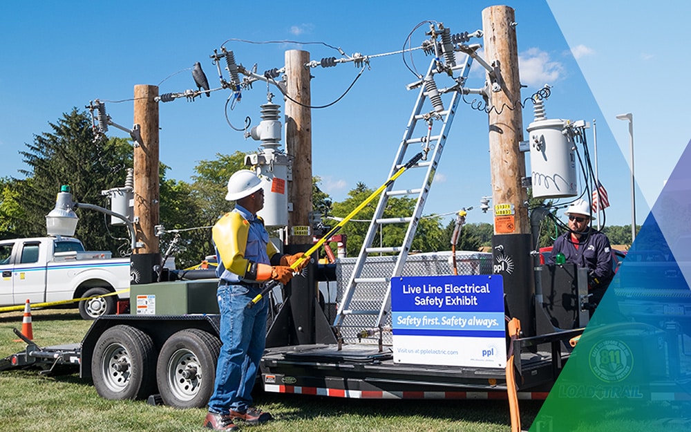 A PPL employee demonstrates how to stay safe around electricity.